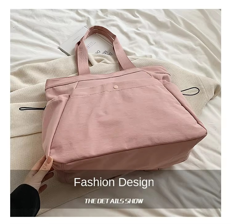 detail Product name Custom Logo Printed Strong Nylon Tote Bag Zipper Closure Fashionable Women's Tote Bag for Travel Sports Duffel Bag Side Cinch Model number 0123 Size 40*14*32cm Color Multi-options Material Nylon MOQ Customised LOGO 50 Pieces Key words strong nylon handbag ladies nylon handbags custom nylon big handbag nylon tote bags with custom printed logo nylon tote bag with zipper nylon tote bags with custom printed logo recycled nylon tote bag women fashion nylon tote bag