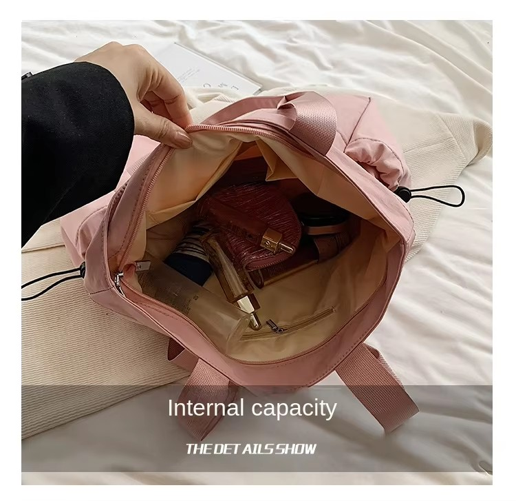 inside Product name Custom Logo Printed Strong Nylon Tote Bag Zipper Closure Fashionable Women's Tote Bag for Travel Sports Duffel Bag Side Cinch Model number 0123 Size 40*14*32cm Color Multi-options Material Nylon MOQ Customised LOGO 50 Pieces Key words strong nylon handbag ladies nylon handbags custom nylon big handbag nylon tote bags with custom printed logo nylon tote bag with zipper nylon tote bags with custom printed logo recycled nylon tote bag women fashion nylon tote bag