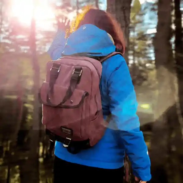woman with grey backpack